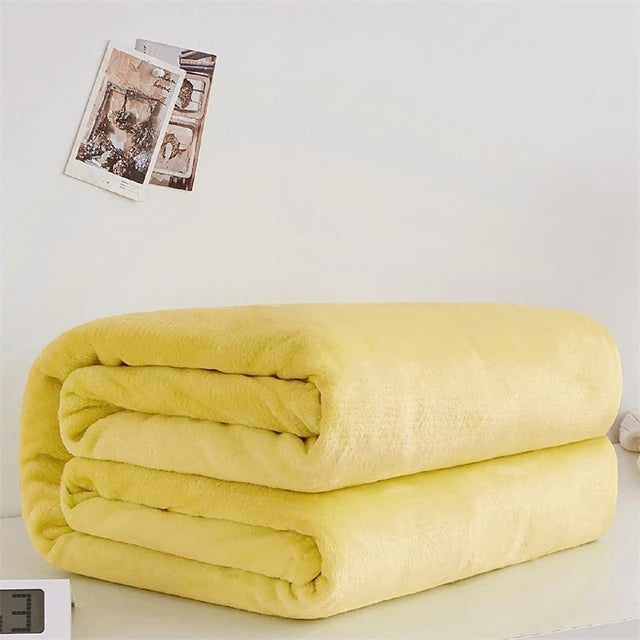 Senfgelbe Fleecedecke