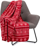 Plaid de noël sur un fauteuil